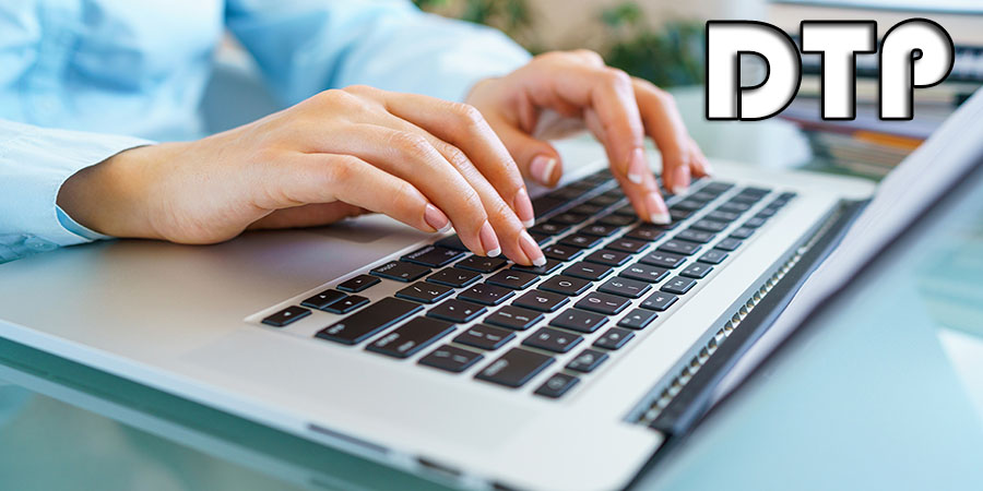 Woman office worker typing on the keyboard